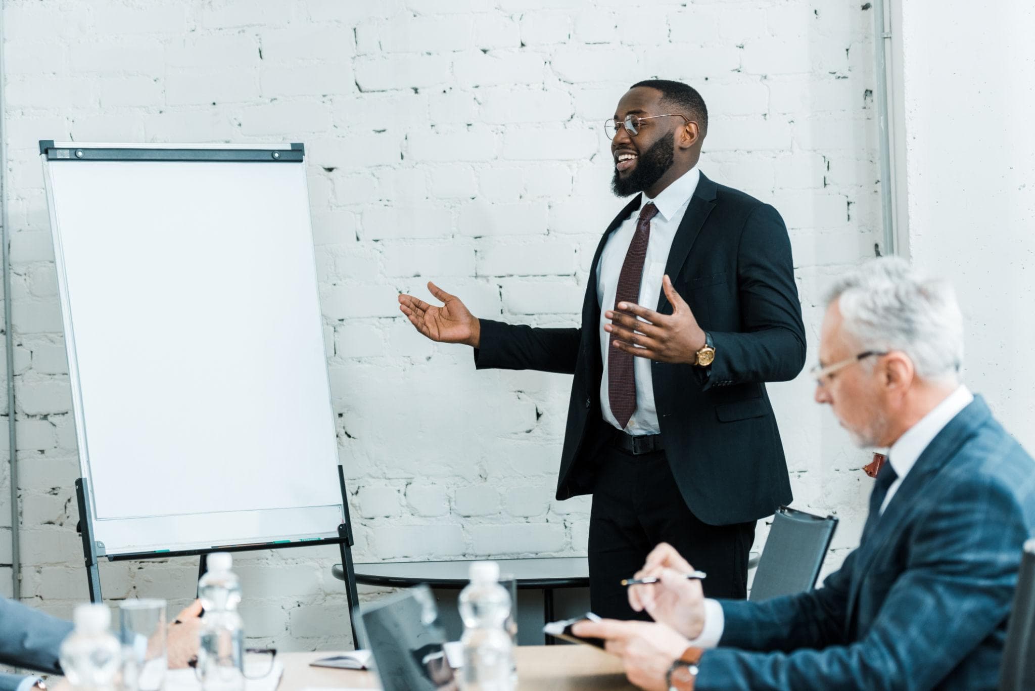 Business leader presenting strategy to a team