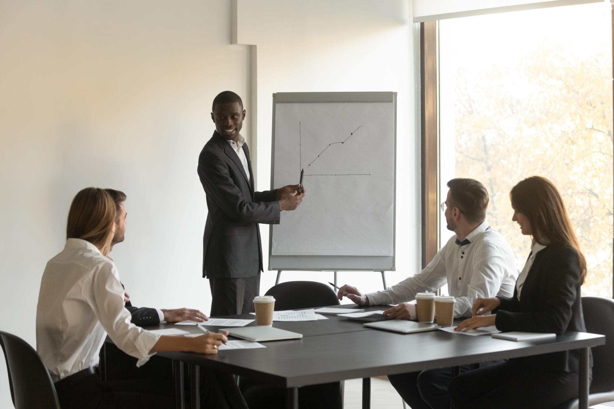 Speaker presenting strategy to a business audience